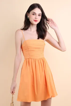 LOLA SLEEVELESS RUCHED ROMPER DRESS IN ORANGE